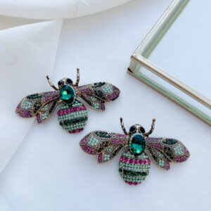 buzzy broche an