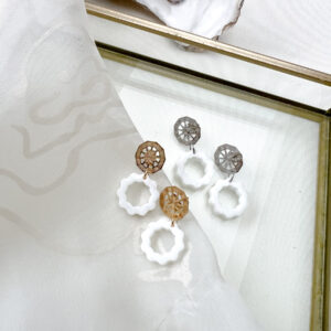 white sun oorbellen an